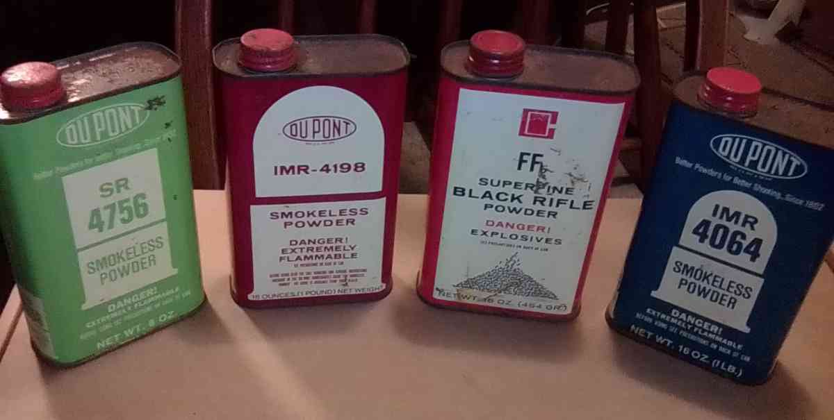 collection of gunpowder tins