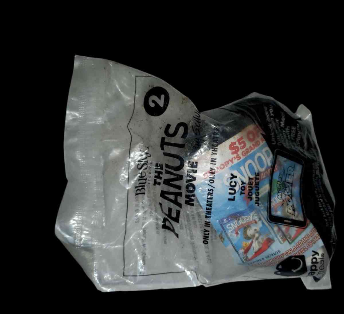 This McDonalds Happy Meal toy features Lucy from The Peanuts