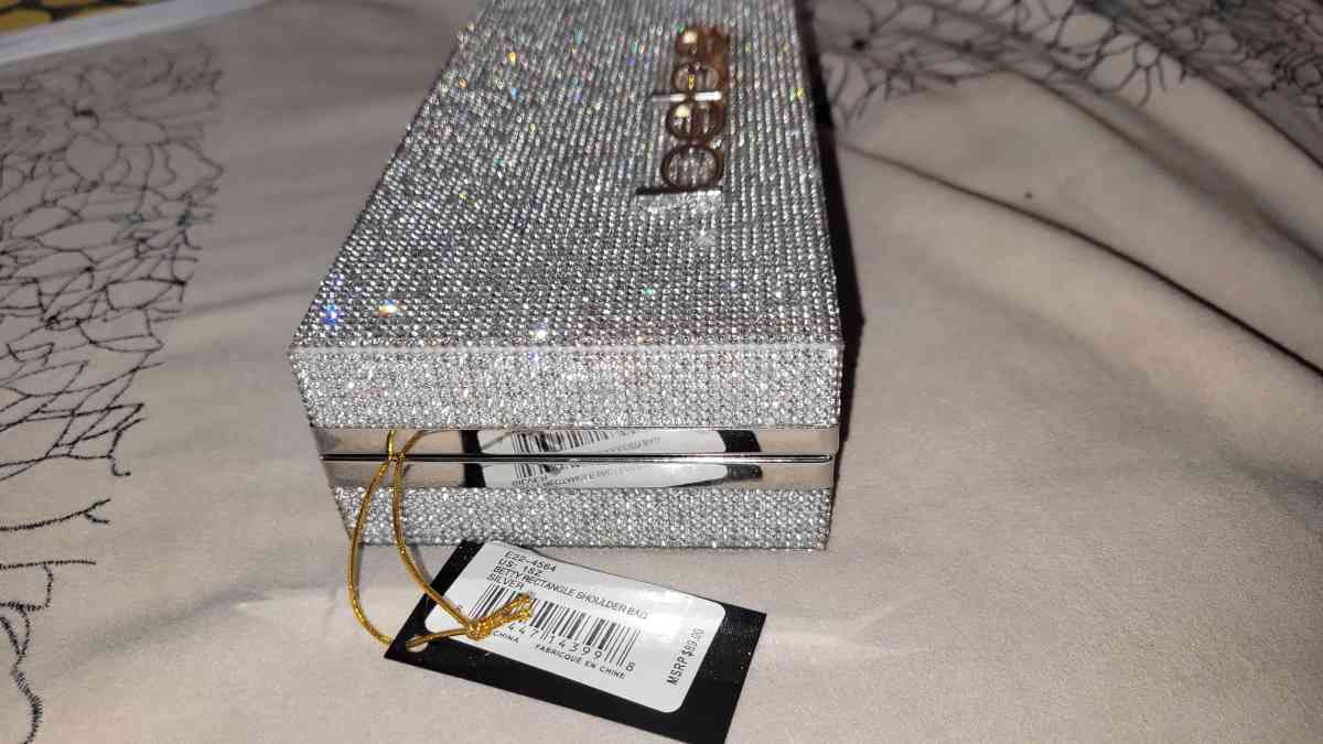 brand new with tags bebe clutch