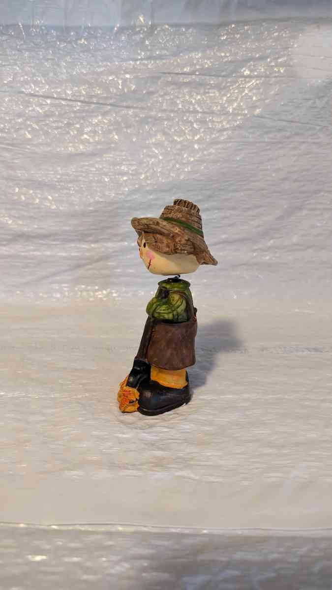 Resin Bobble Head Scarecrow Girl Raking Fall Leaves Figurine