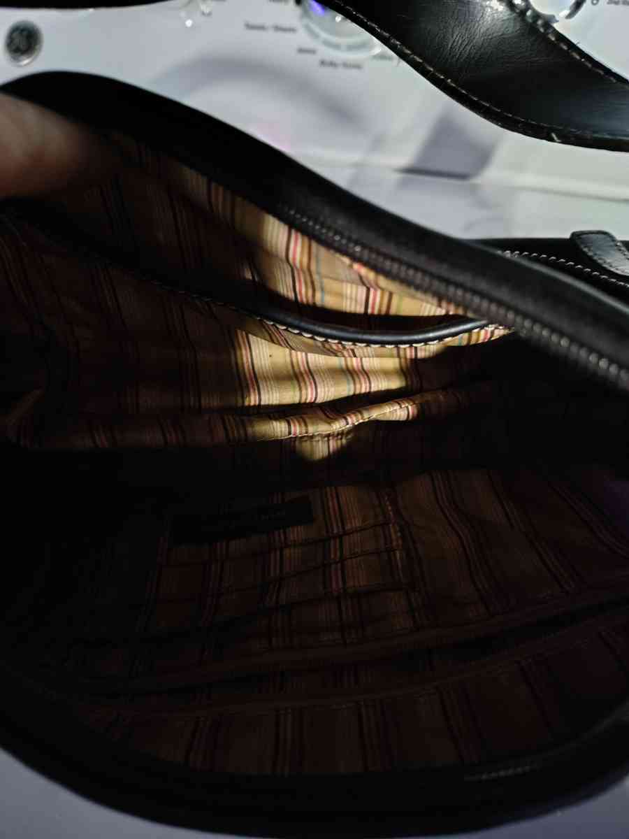 a black small purse Mine West