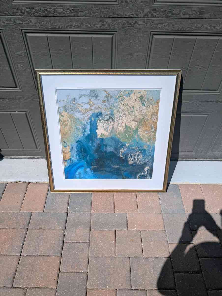 Pictures and coffee table and end table and wall art