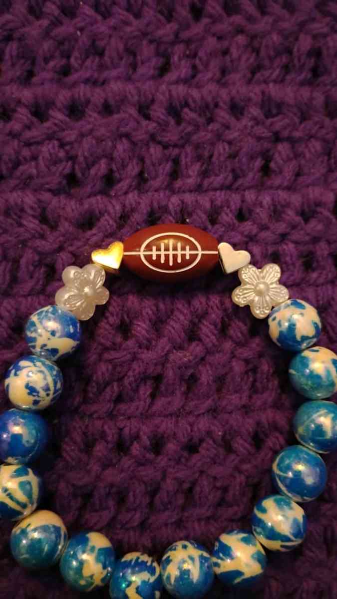 Football bracelet with blue accent beads