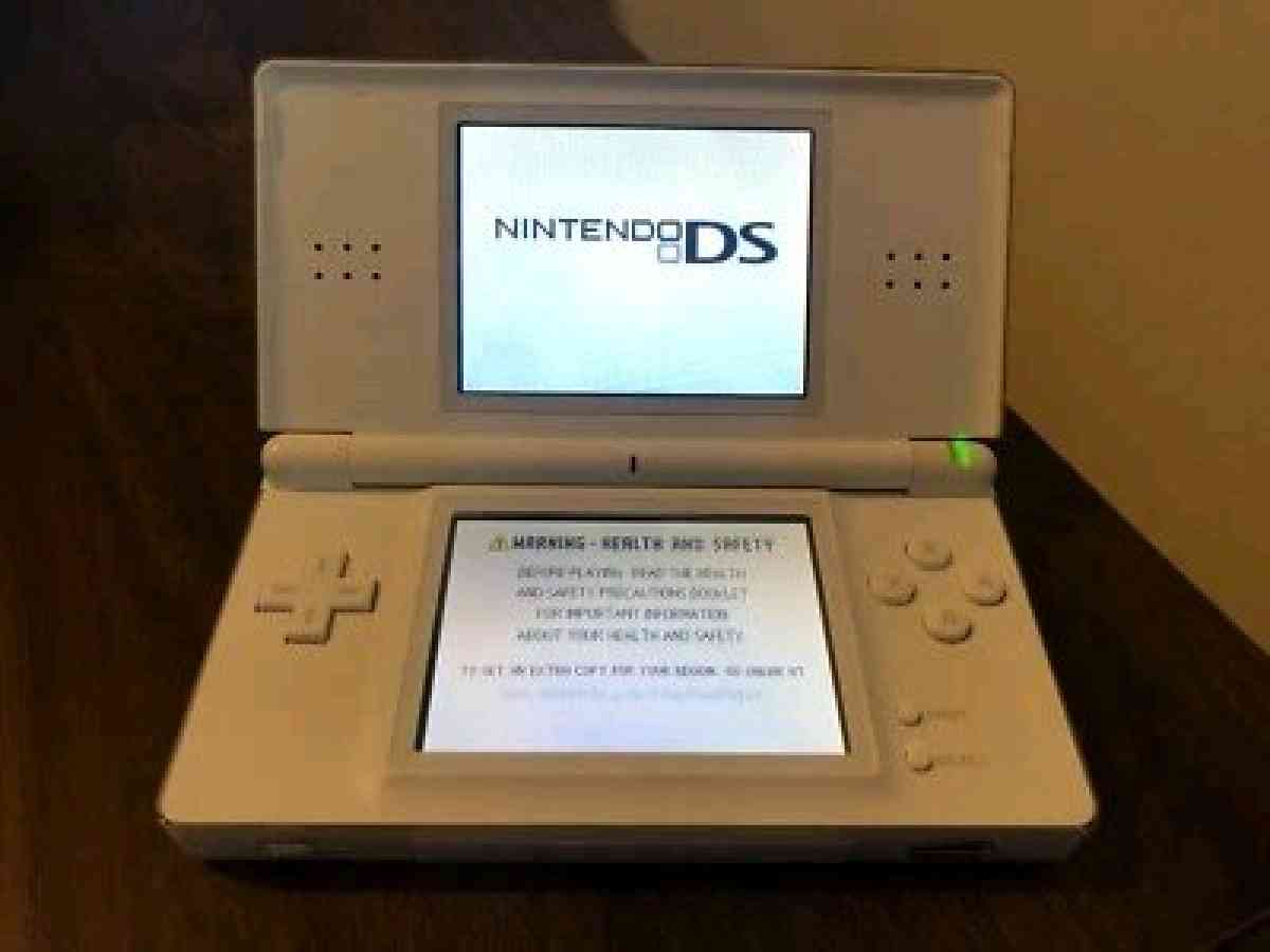 NINTENDO DS LITE AND CHARGER - Coconut Creek, Florida - FleaMarketBay