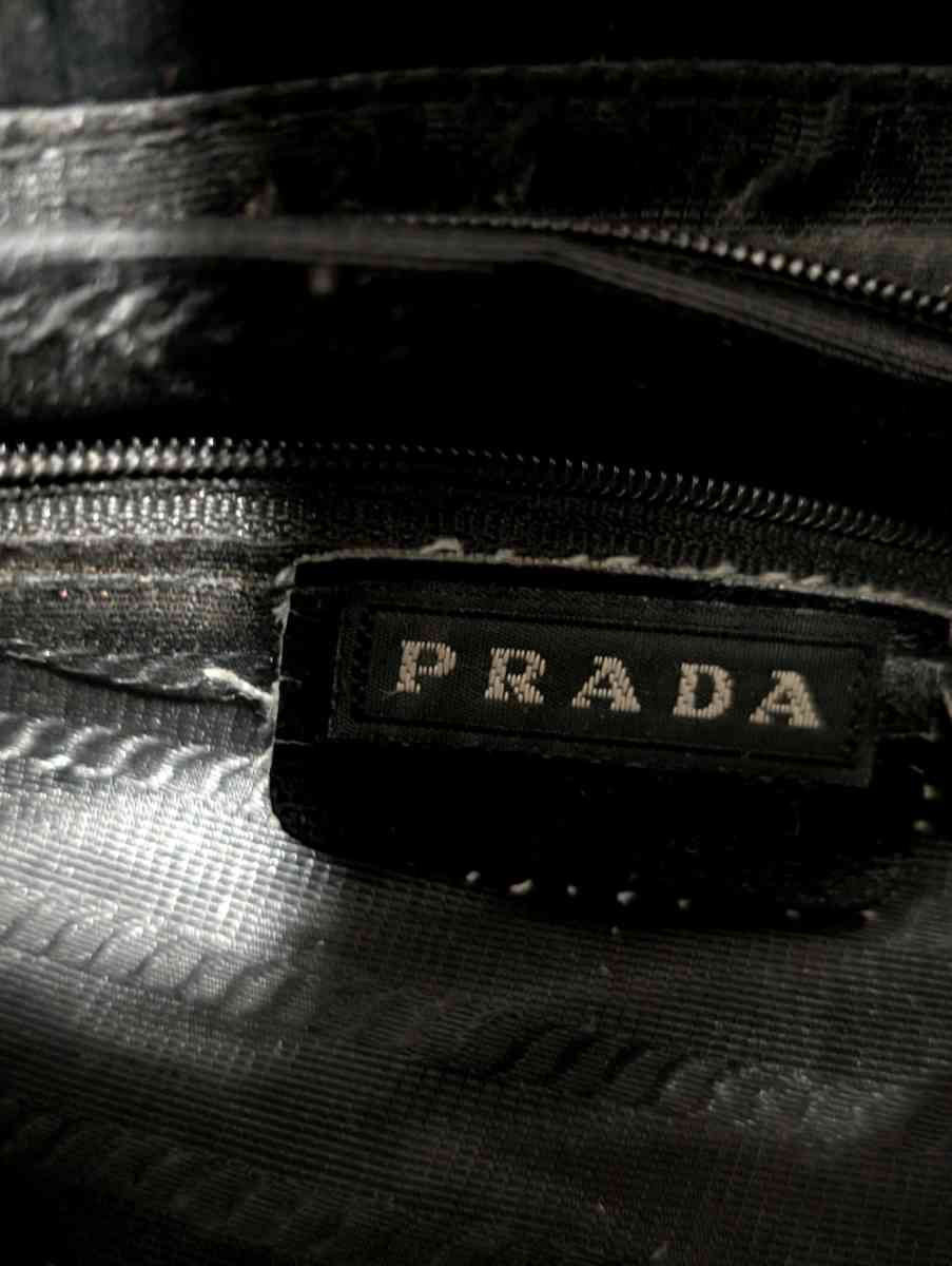 Prada Black Leather Purse with Structured Design
