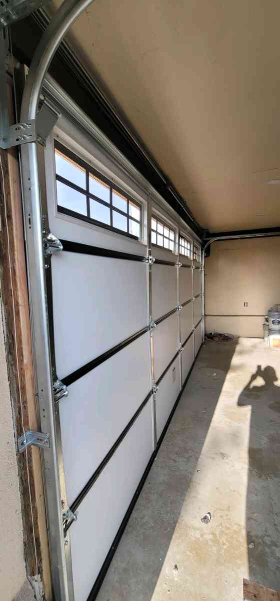 REPAIRS GARAGE DOORS