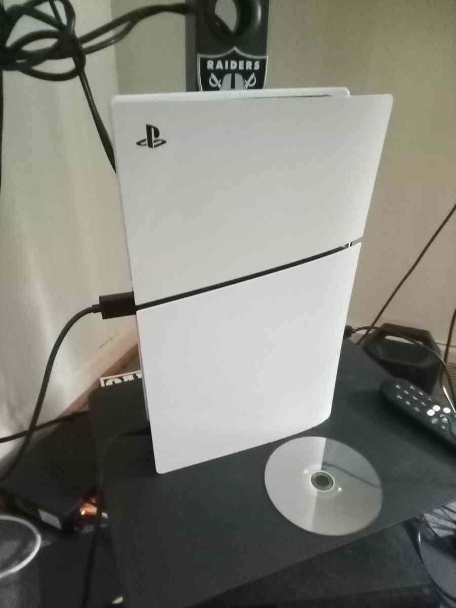ps5 with 1 controller and 3 games