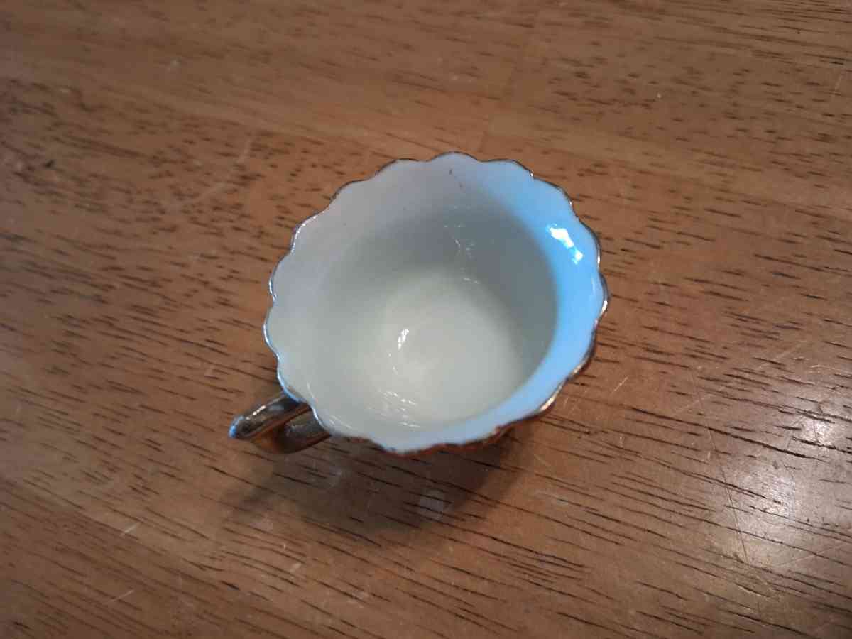 orange and pink flower design tiny teacup