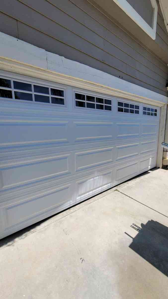 NEW GARAGE DOORS