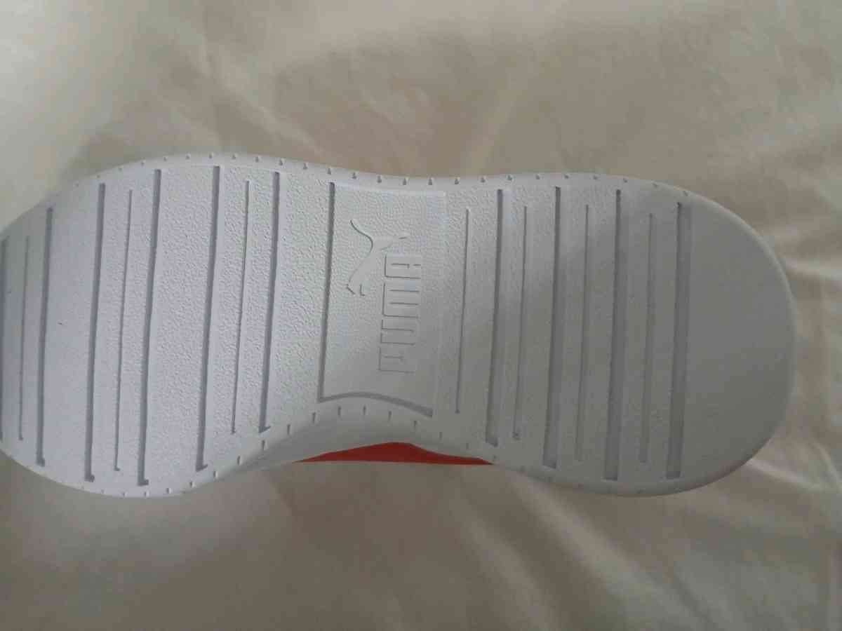 brand new red and white puma sneakers
