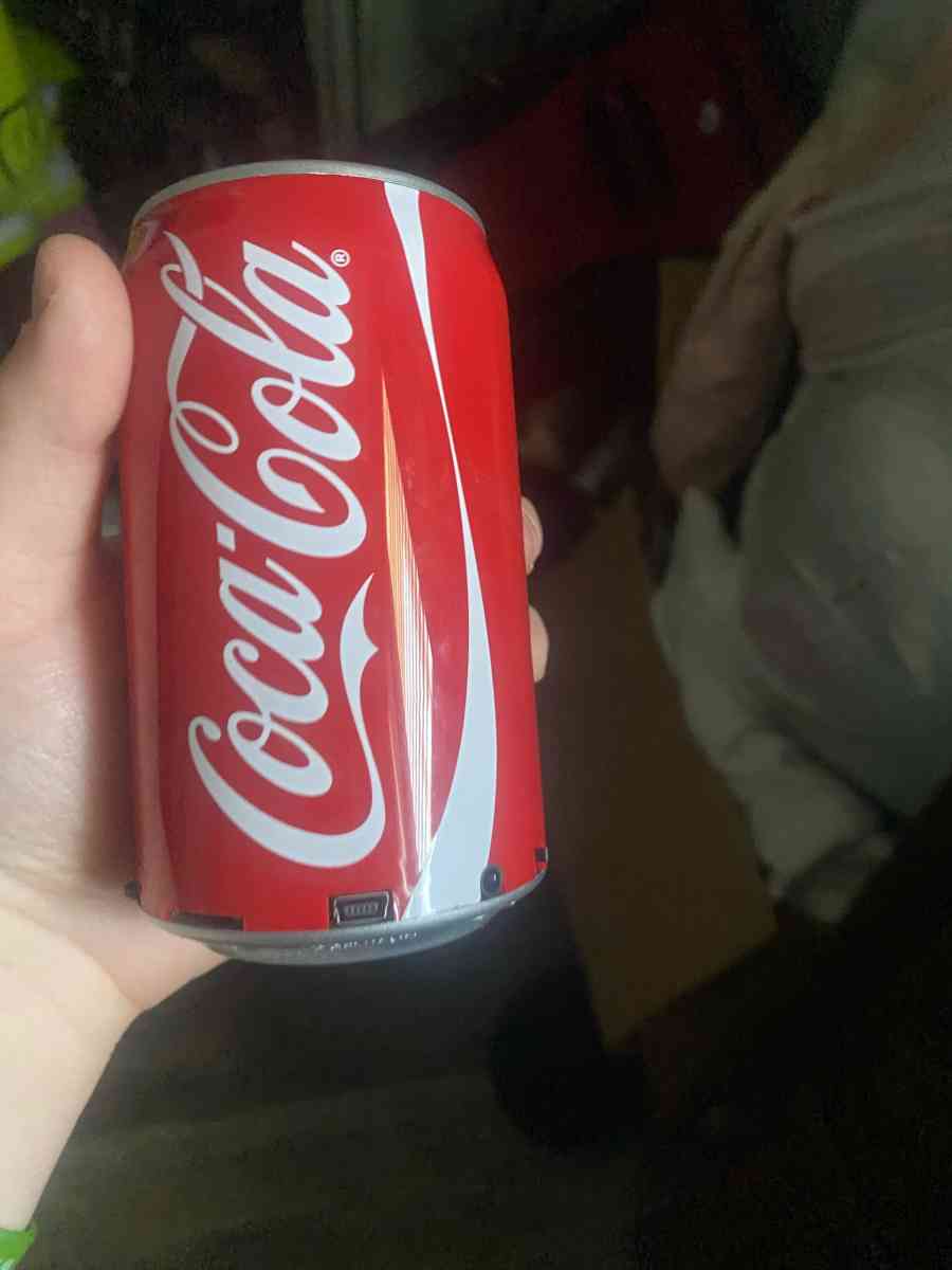 books and a CocaCola speaker