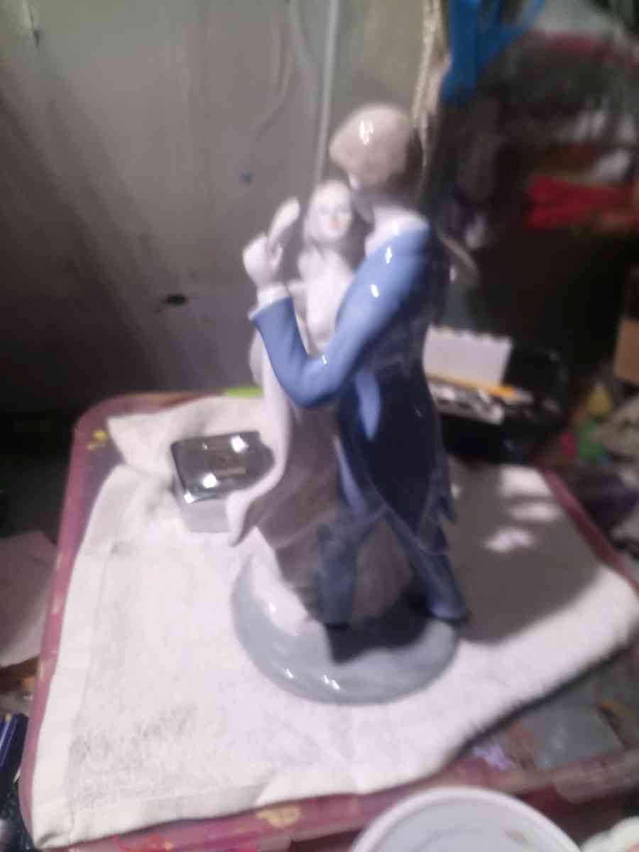 porcelain wedding figurine of man and woman