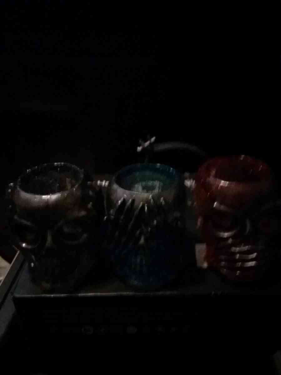 4 different sets of hear see or speak evil candle holders