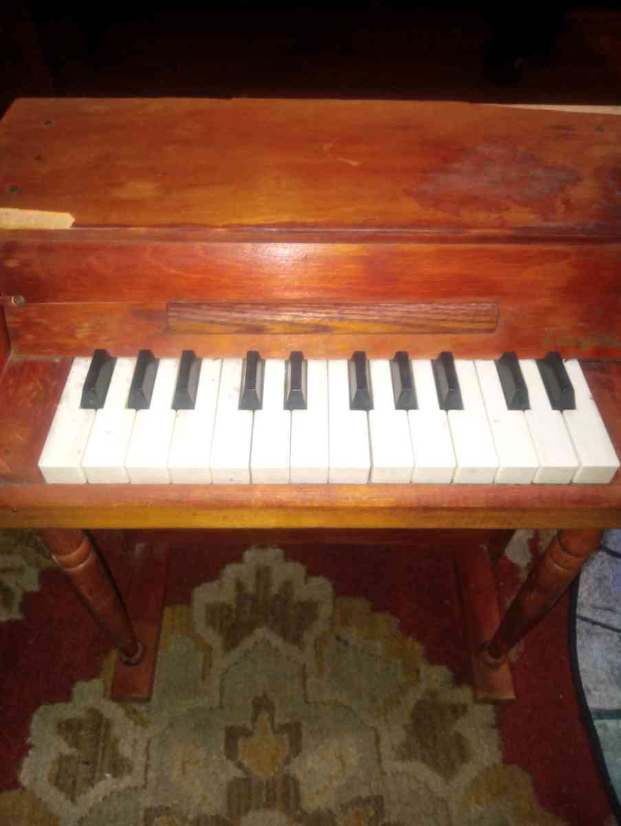 small antique vintage piano