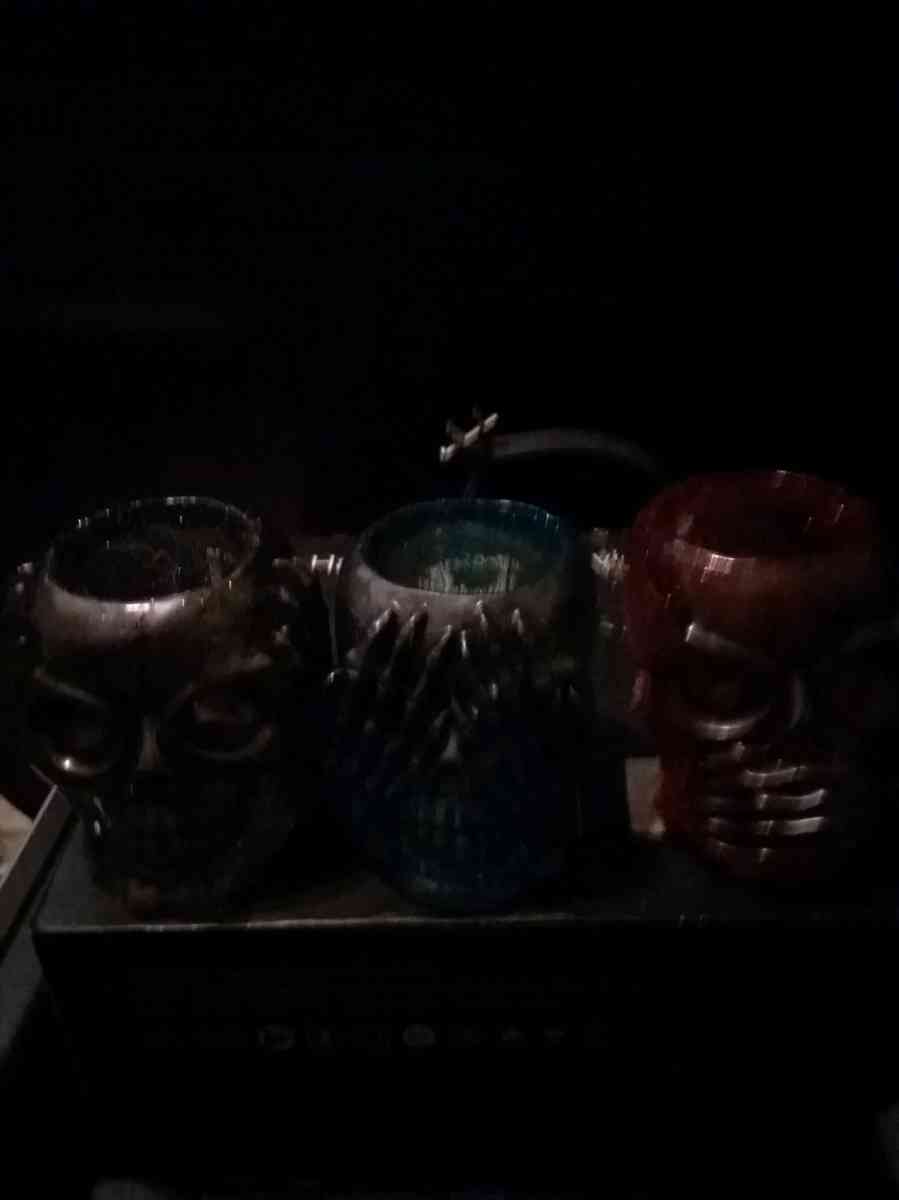 4 different sets of hear see or speak evil candle holders