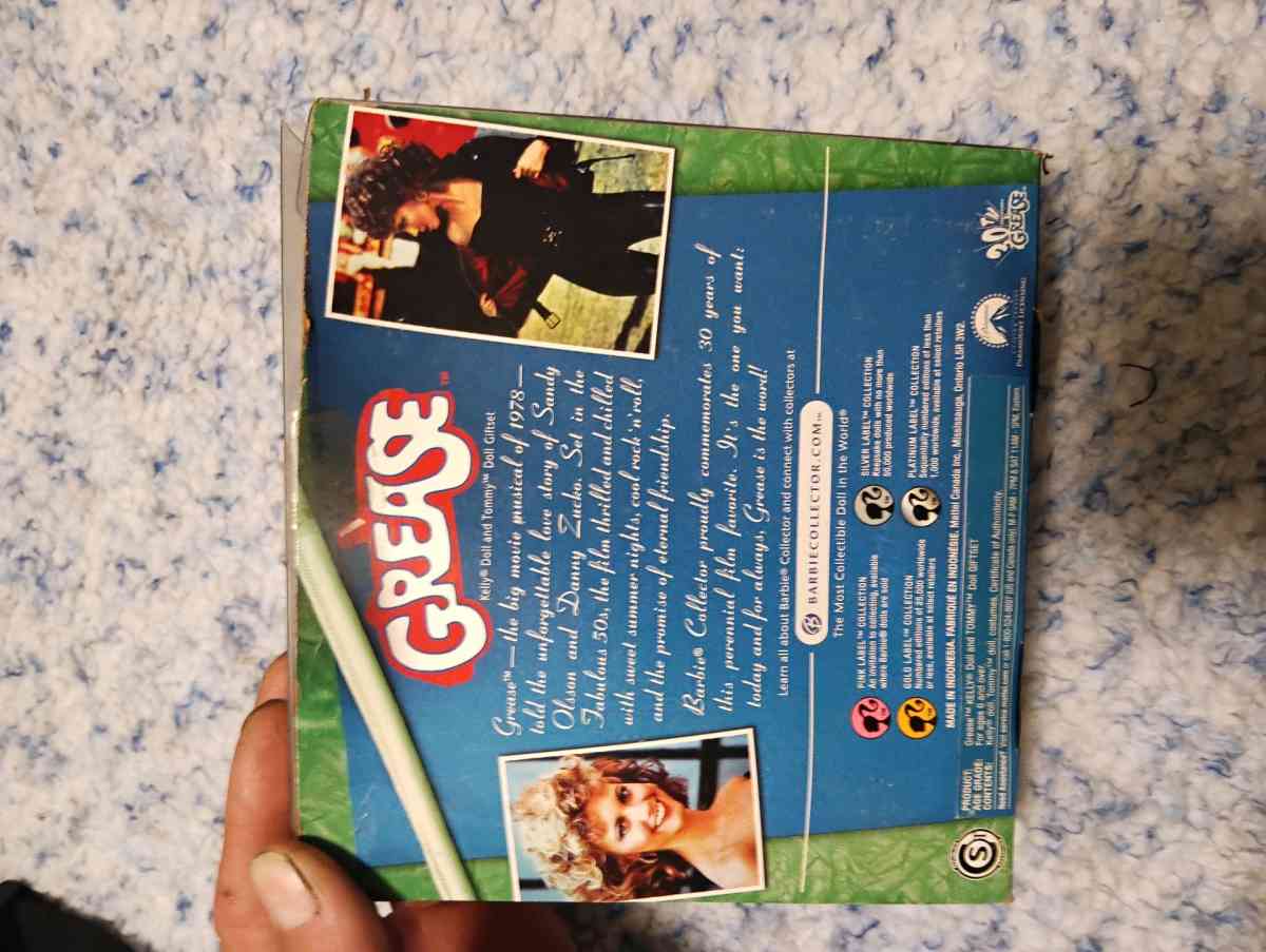 30 year of the movie Grease featuring Sandy and Danny dolls