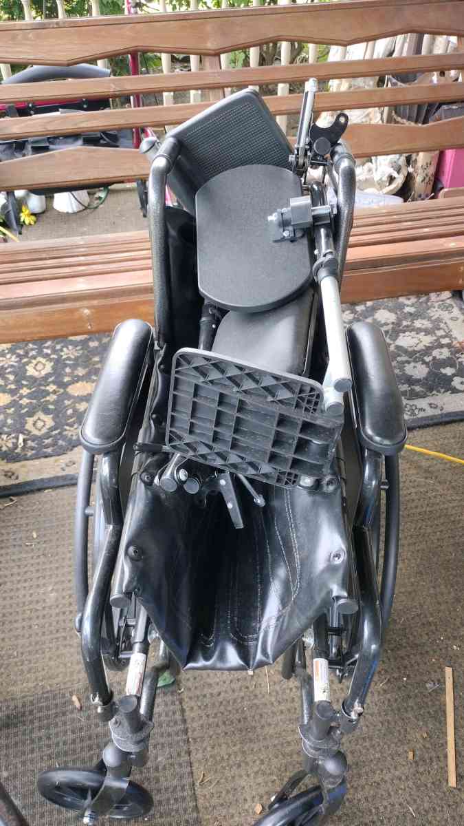 a brand new wheelchair never used that has the foot rest