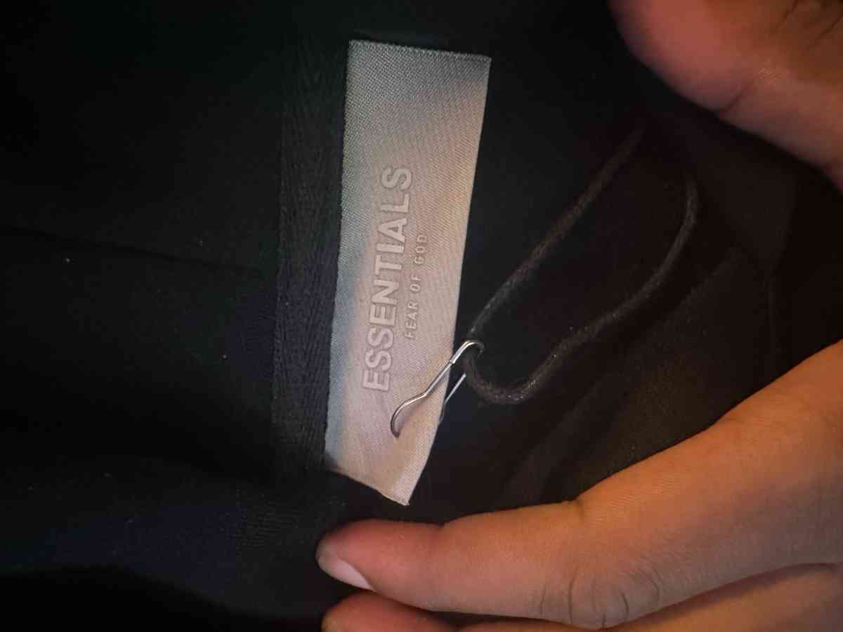 essentials hoodie size large