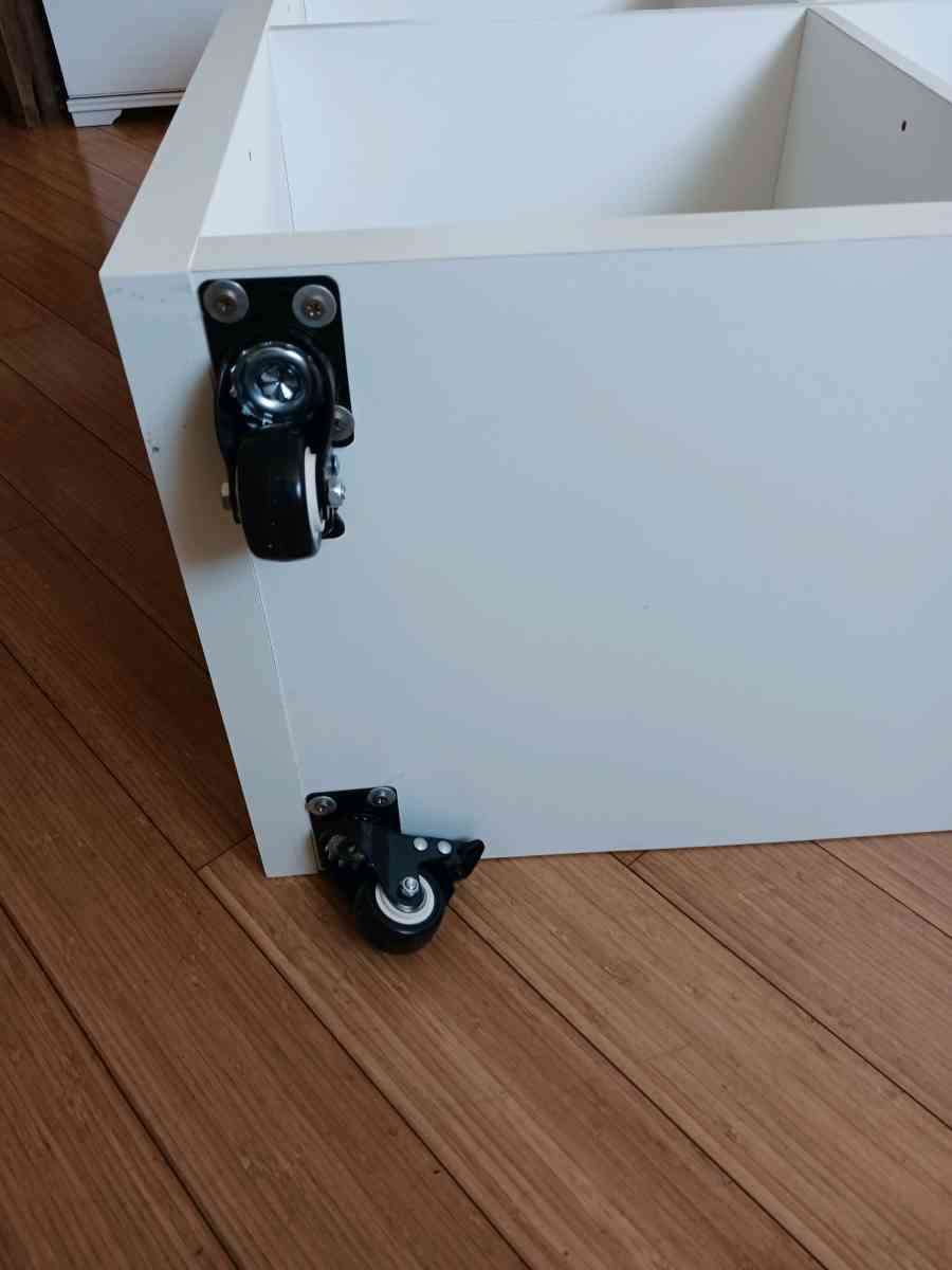 White Bookshelf on Wheels  9 Cube Storage Scratches  Holes - Bronx, New York - FleaMarketBay