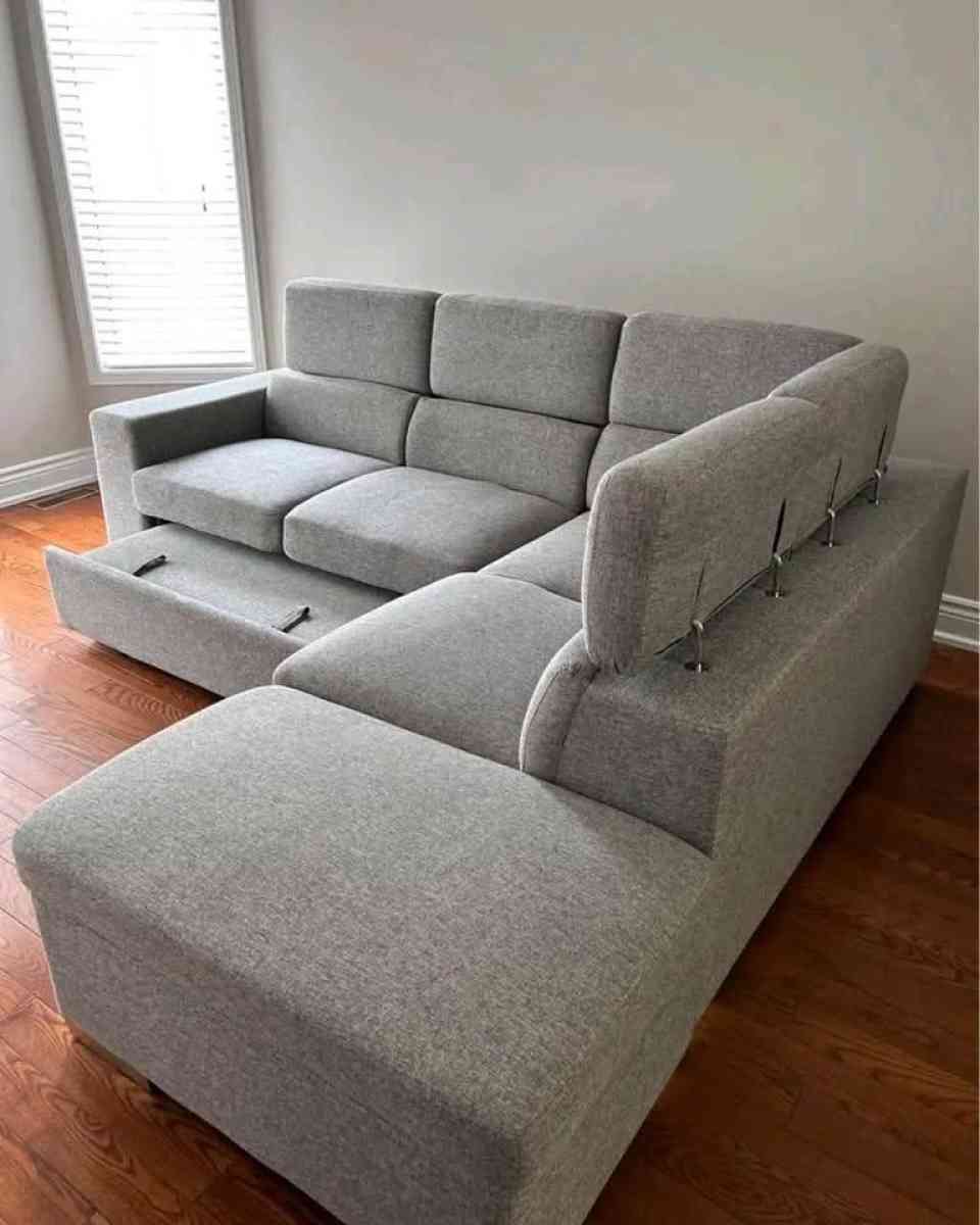 Grey Sectional sofa with pull out bed