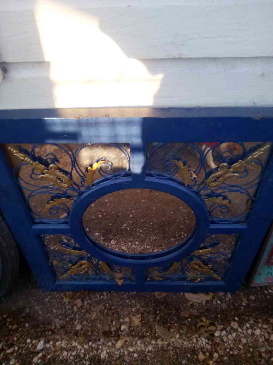 large mirror  small Spanish mirror