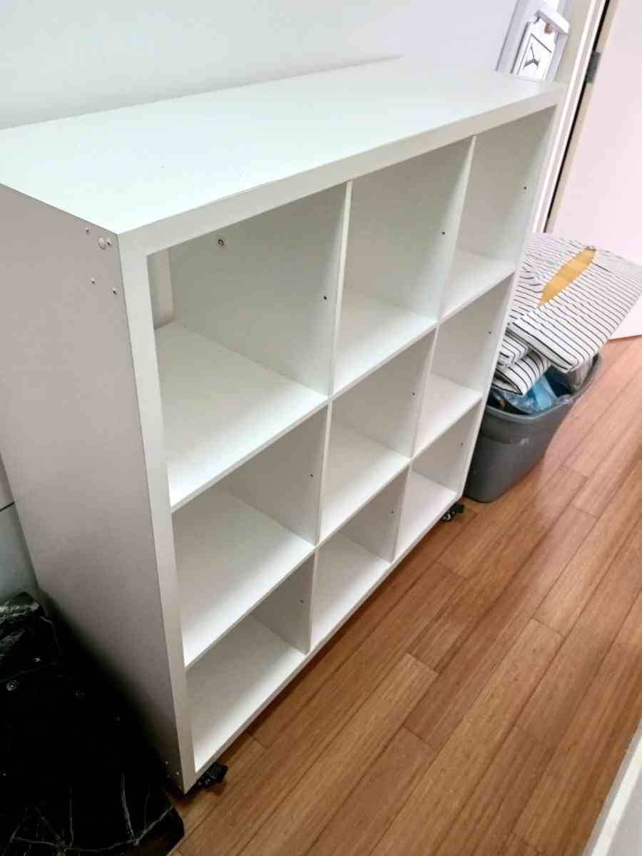 White Bookshelf on Wheels  9 Cube Storage Scratches  Holes - Bronx, New York - FleaMarketBay
