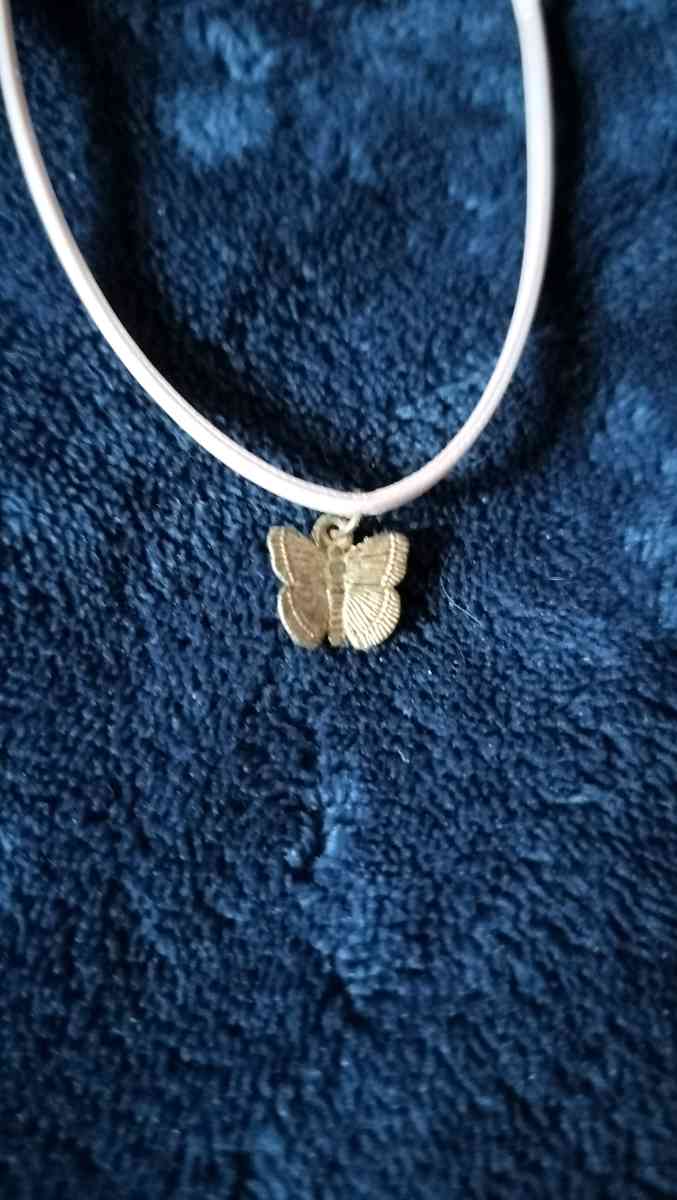 Two choker necklaces and a silver bracelet