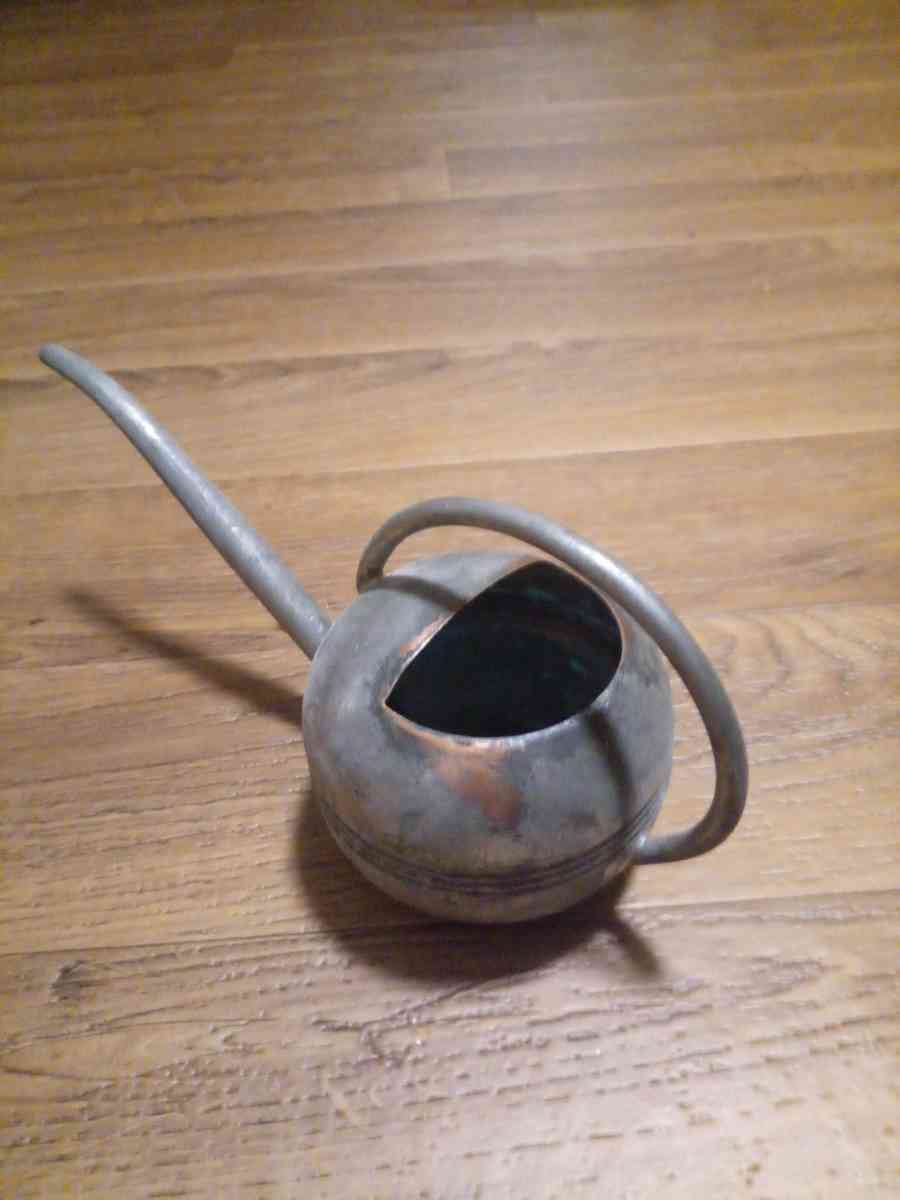 copper watering can