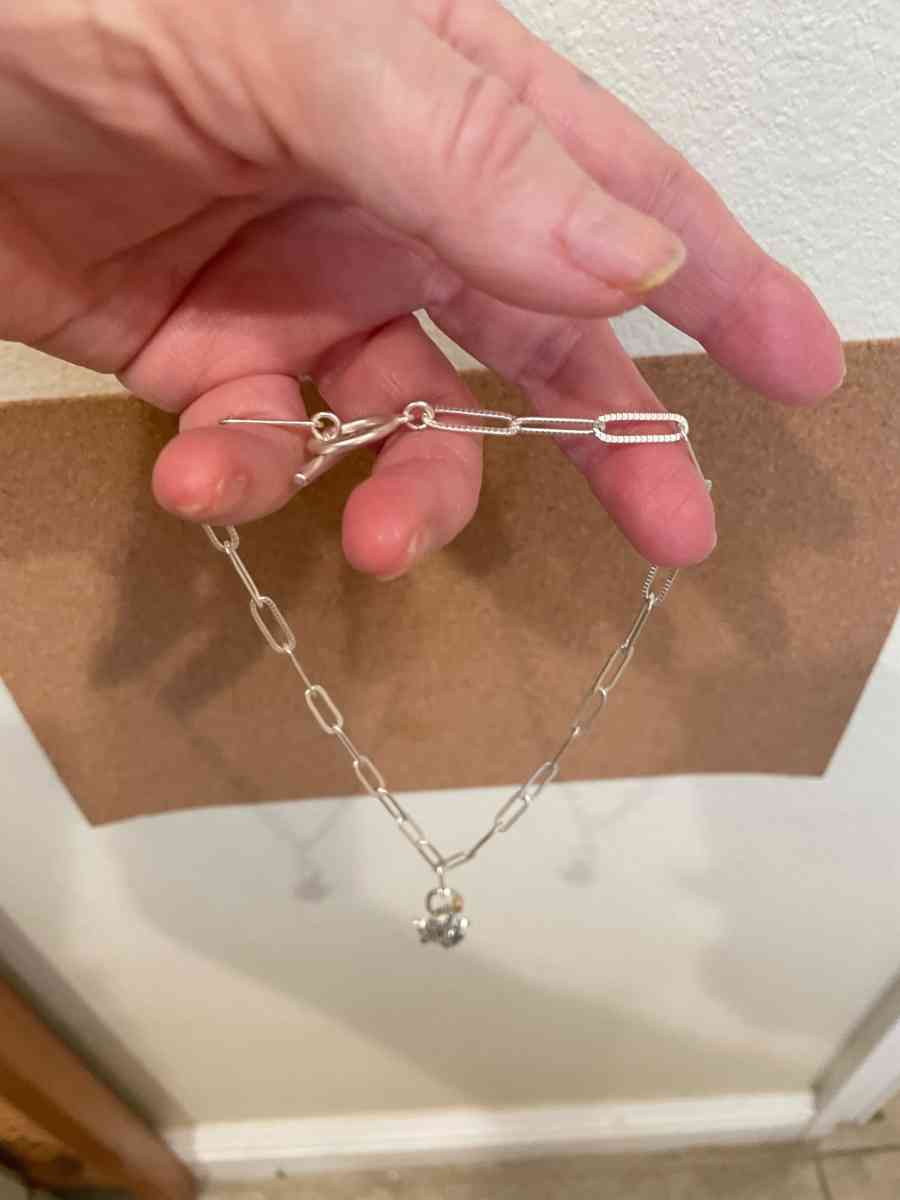 Popular necklace with charm holder and charms