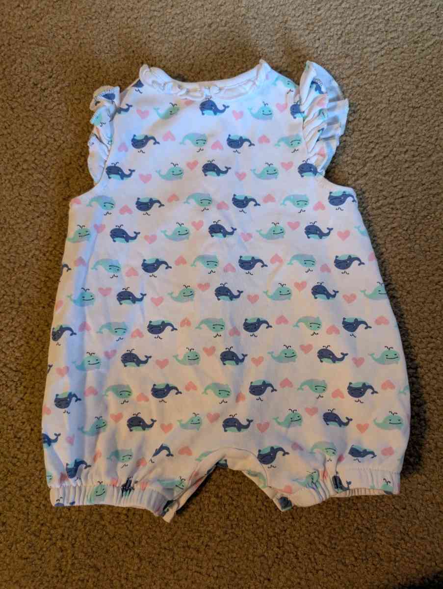 Baby romper with a whale pattern