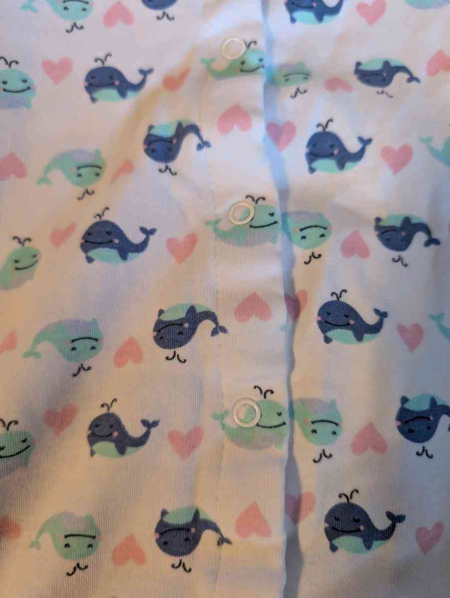 Baby romper with a whale pattern