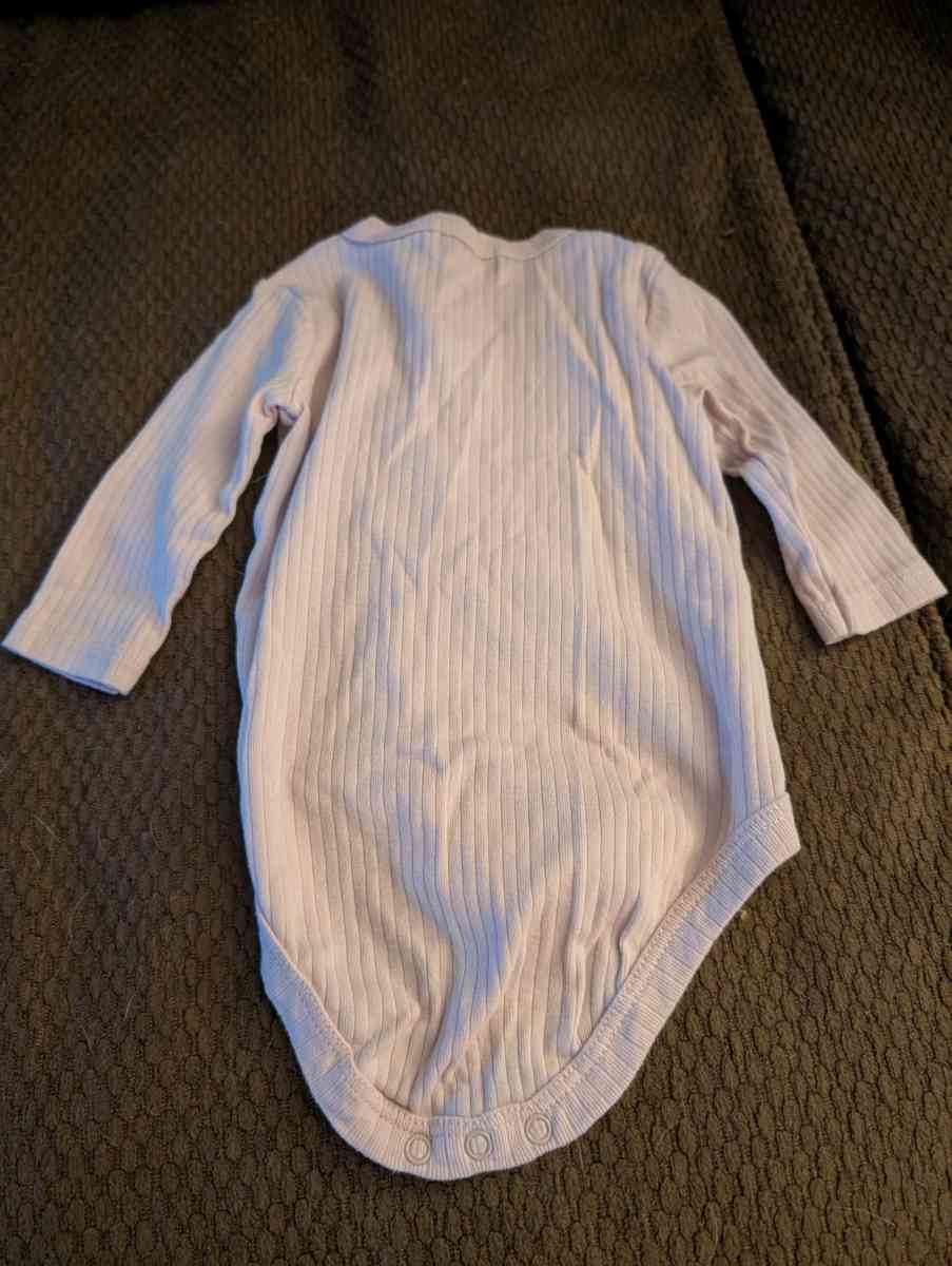 Baby onesie with buttons