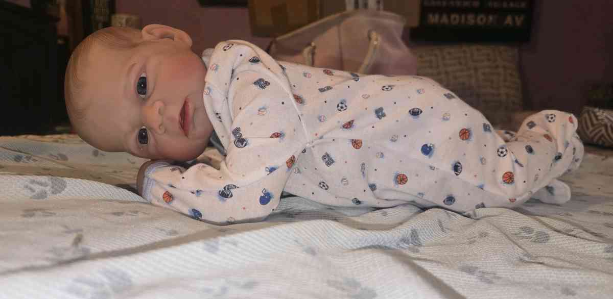 Realistic looking baby boy doll