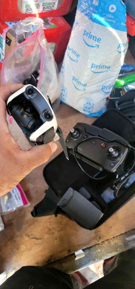 DJI mini drone with 3 batteries  accessories