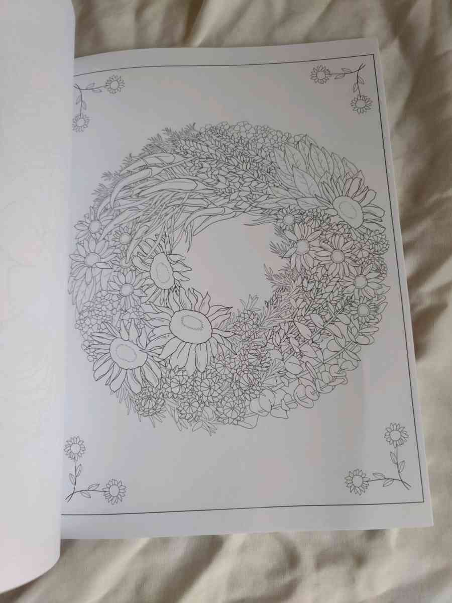 Creative Haven Floral wreaths coloring book