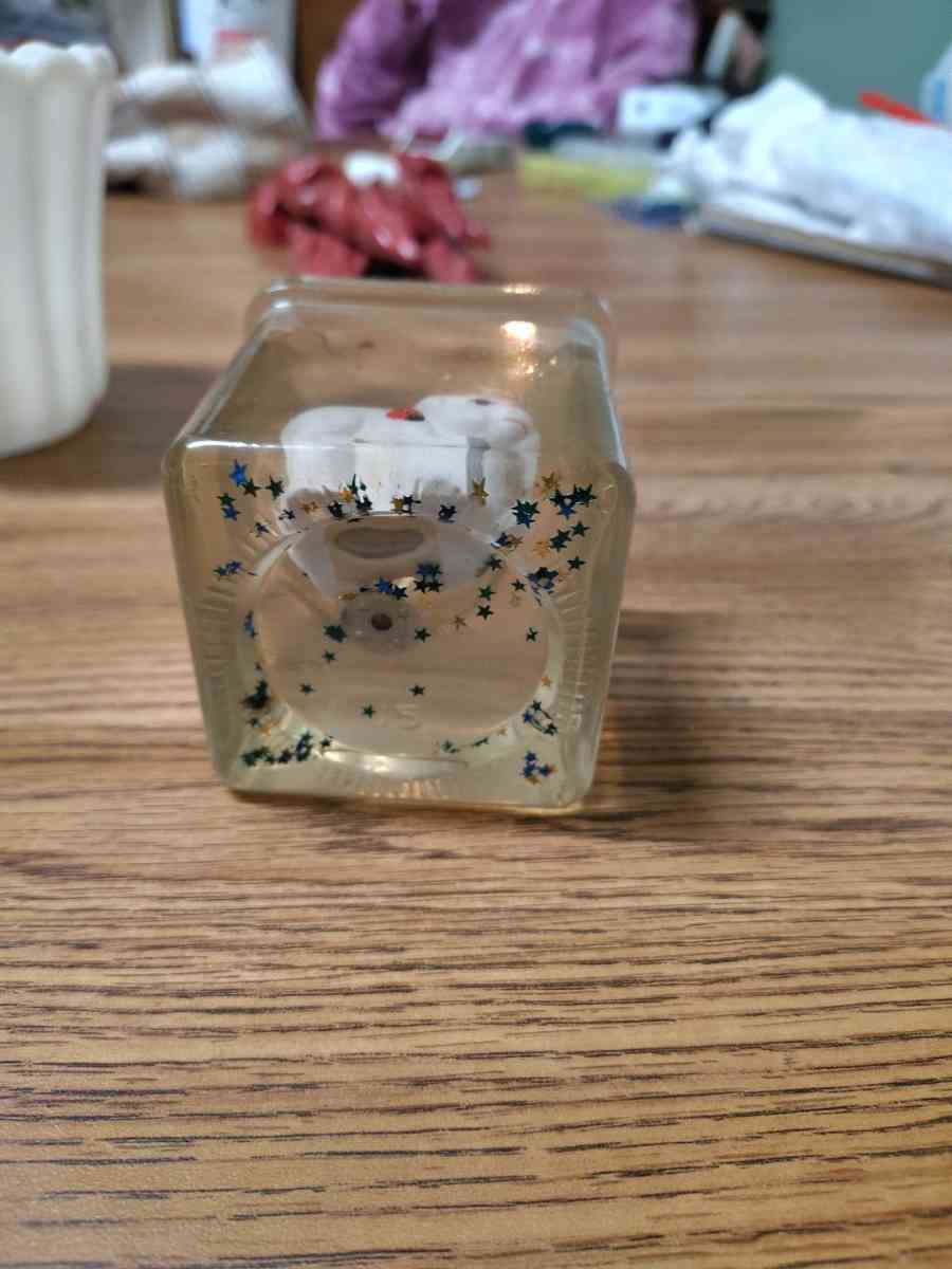 clear jelly candle with small white animals in the candle - Saint Joseph, Missouri - FleaMarketBay