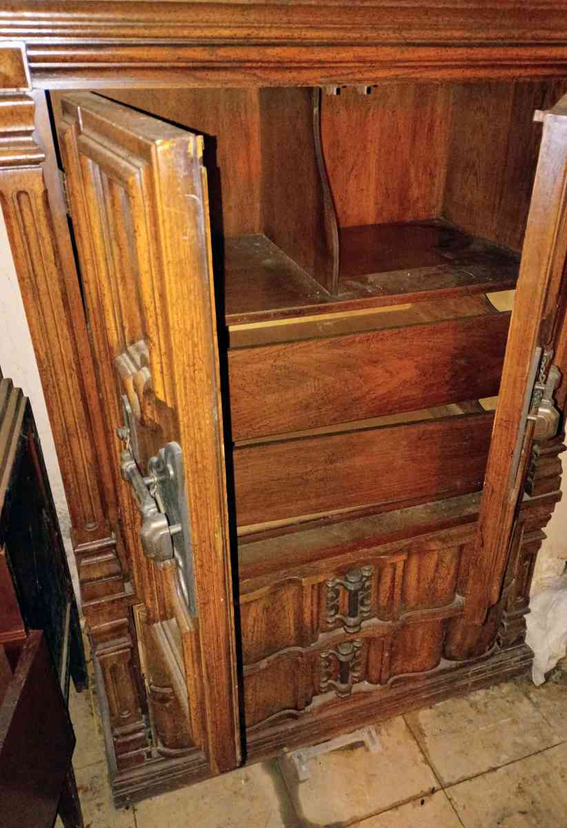 antique wooden cabinet with decorative designs