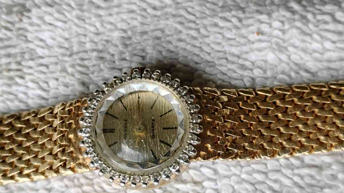 14 karat gold diamond Geneva quartz watch for ladies