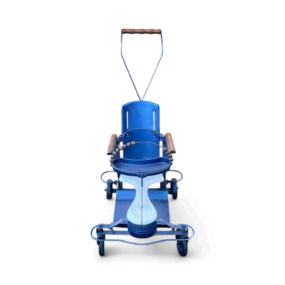 Antique baby scroller