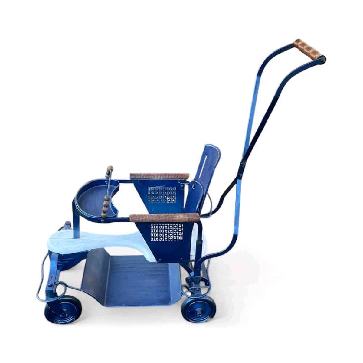 Antique baby scroller