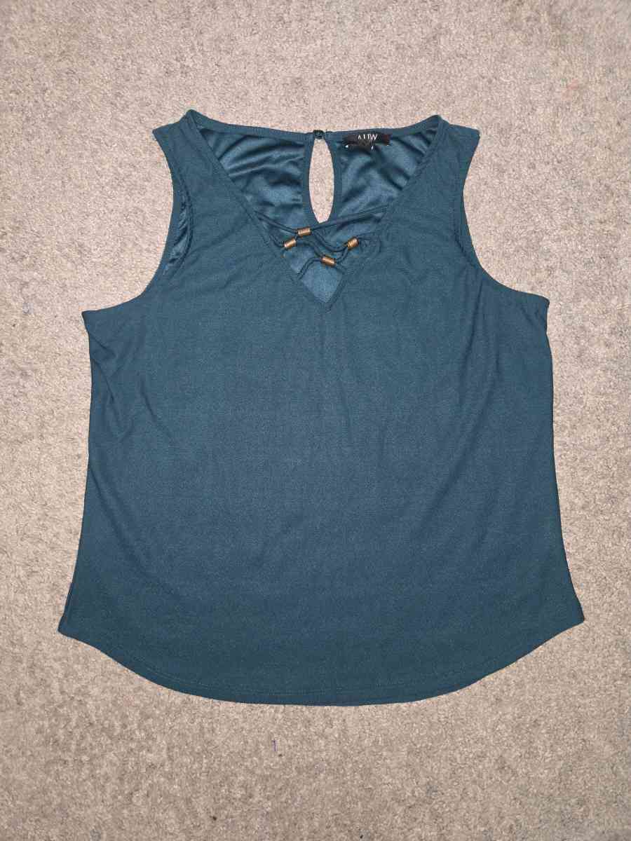 Teal shirt - Homer, Alaska - FleaMarketBay