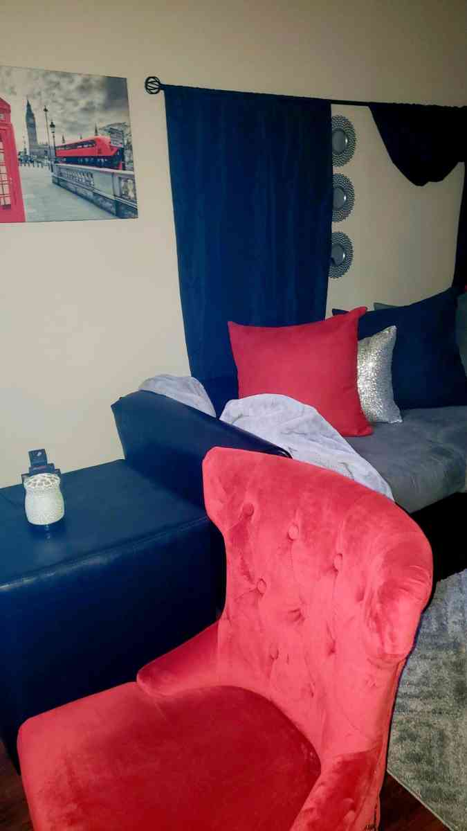 Black leather an grey sectional