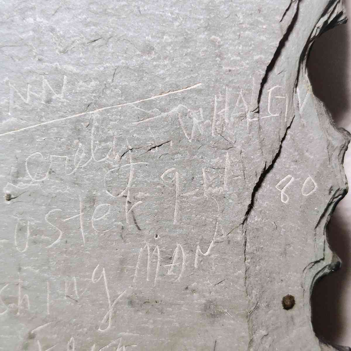 Slate drawing of a Wharf Fisherman