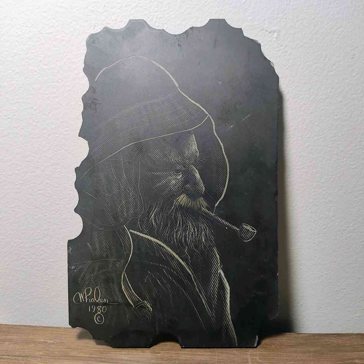 Slate drawing of a Wharf Fisherman