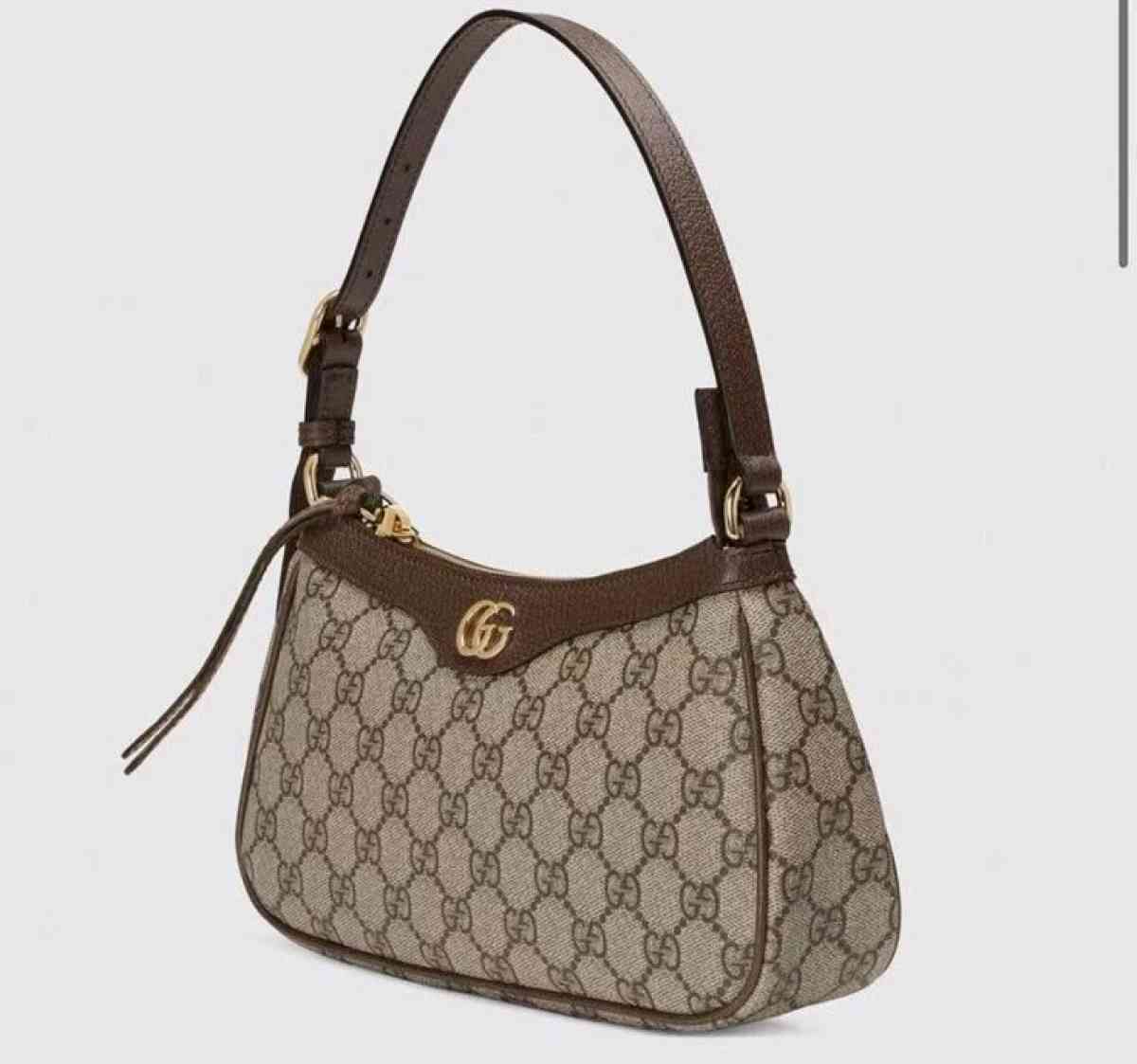 brown Gucci bag
