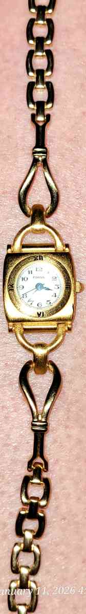 Vintage Fossil gold tone watch with case