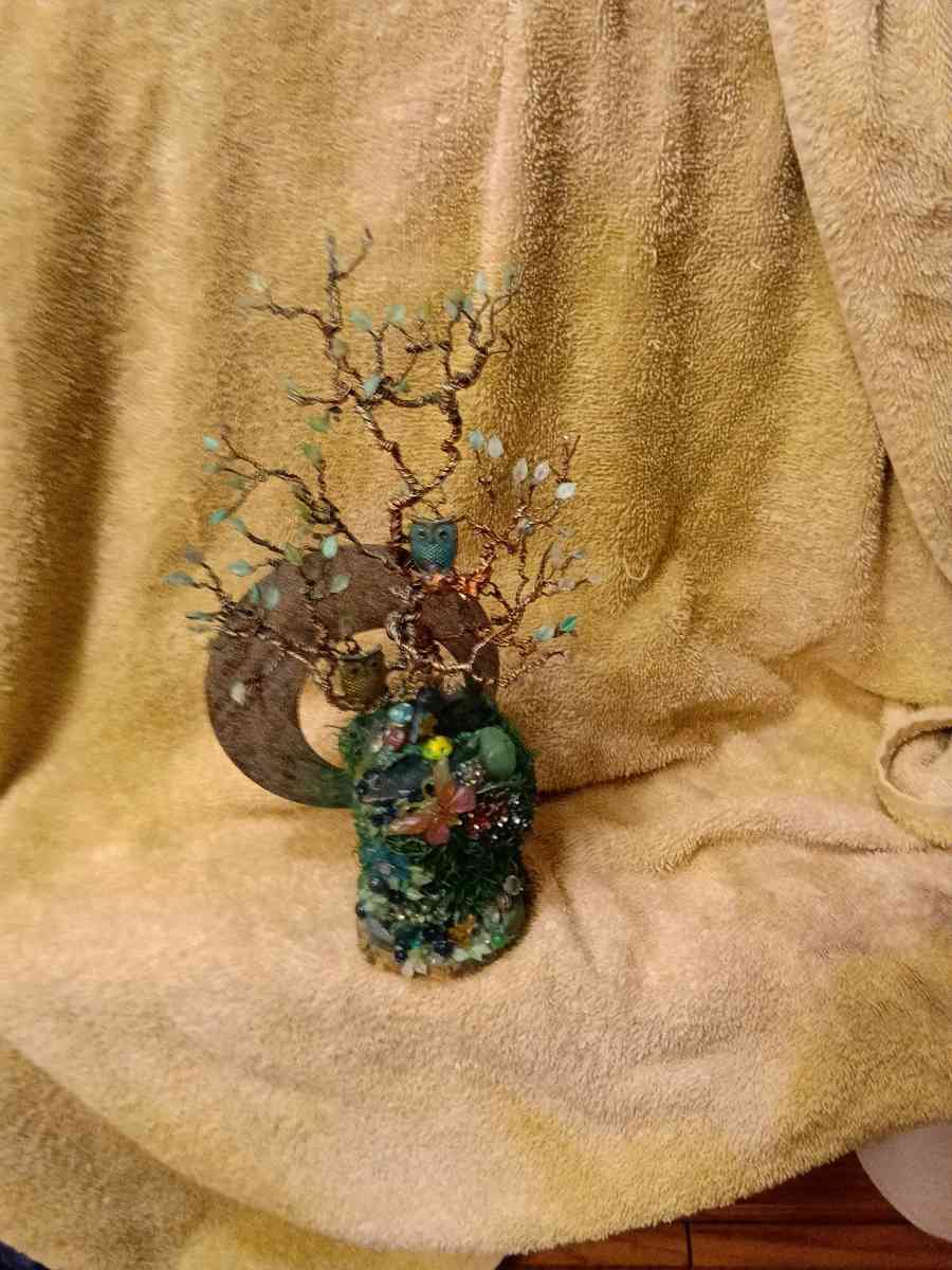 twisted copper tree with two owls
