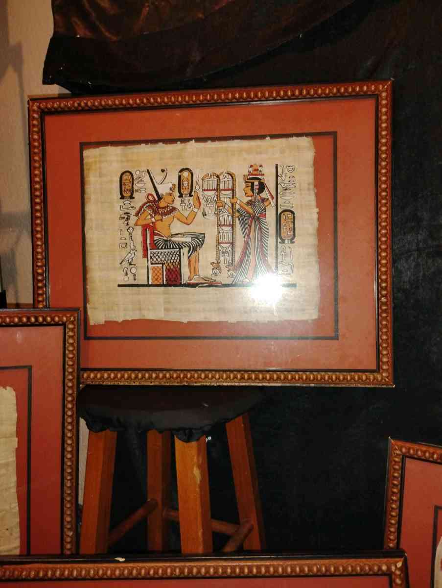 a set of 4 framed Egyptian pictures