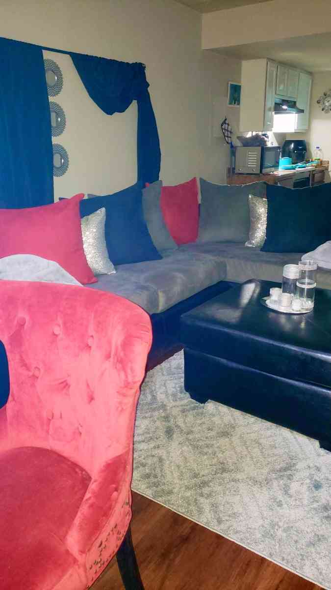 Black leather an grey sectional