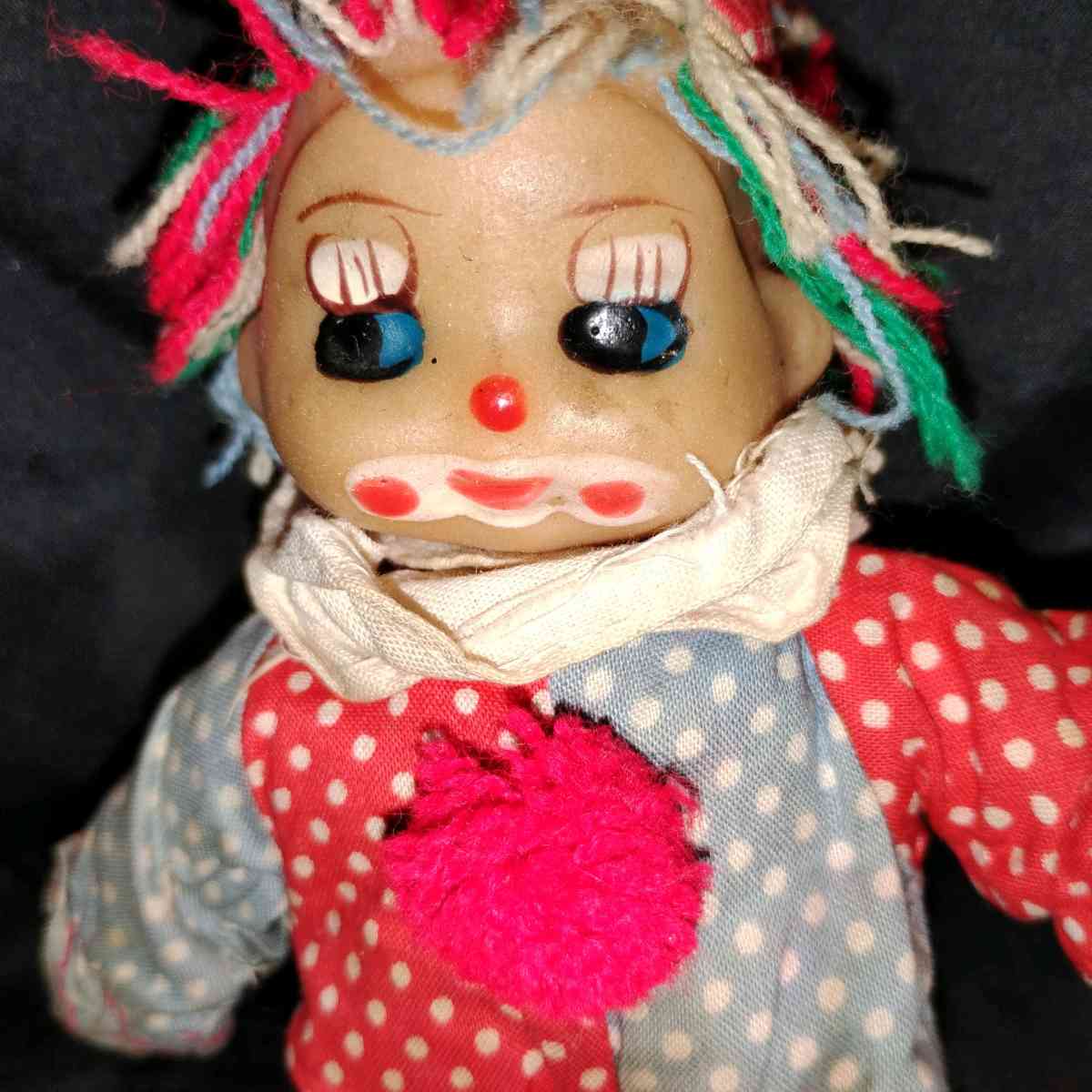 this is a vintage collectible clown doll cloth body vinyl he
